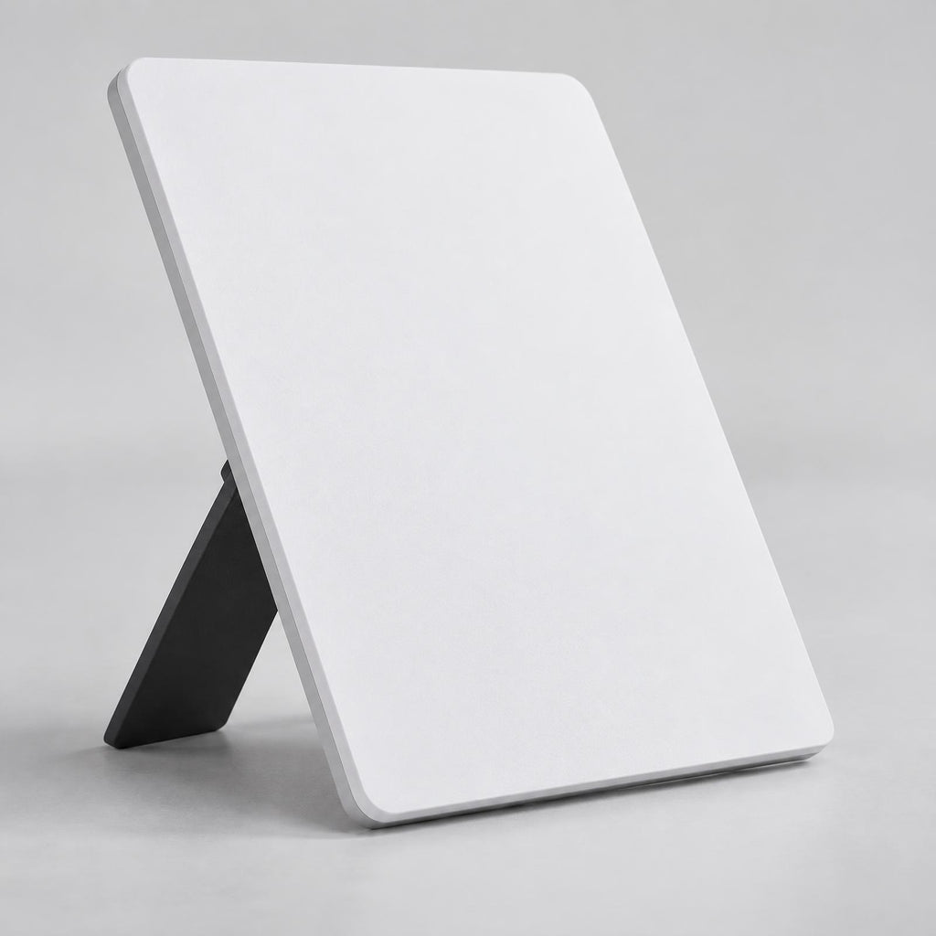 Compact flat white satellite internet terminal with kickstand